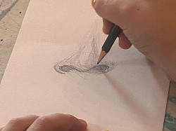 2 minute exercise TAA Student sketches a frontal view of the human nose.